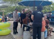 Bhabinkamtibmas Polsek Balige Tingkatkan Keamanan di Pantai Bul Bul dengan Patroli dan Imbauan Kamtibmas
