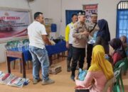 Polsek Perdagangan Bagikan Sembako untuk Warga Kurang Mampu