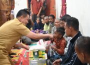 Bupati Humbahas Serahkan Bantuan untuk Korban Kebakaran di Parsingguran II