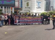 Semarak HUT RI Ke-80, DPD KIM Sumut Bagikan 1.000 Bendera Merah Putih kepada Pengendara