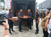 Bupati Taput Terima Bantuan 6.000 Ikan Kaleng dari RM Gumarang untuk Pengungsi Bencana