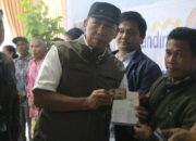 Pemkab Taput Cairkan Dana Tunggu Hunian Kepada 100 KK Korban Bencana