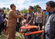 Bupati Taput Salurkan Bantuan di Pangaribuan, Pastikan Pembangunan Jalan Dimulai Tahun Ini