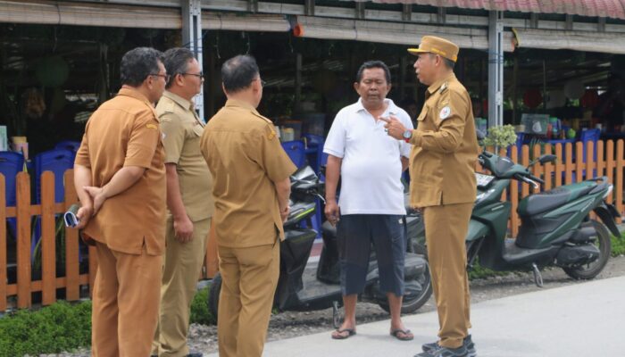 Bupati Taput Genjot Penataan Kawasan Tanggul Aek Sigeaon