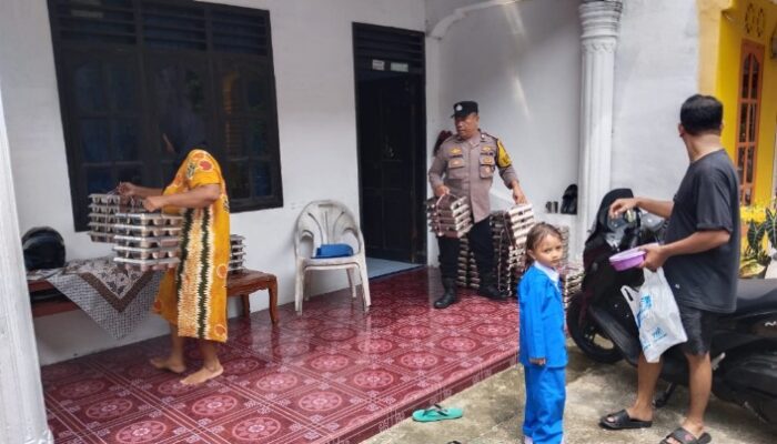 Polisi Kawal Distribusi 102 Paket MBG untuk Balita, Ibu Hamil, dan Ibu Menyusui di Nagapitu